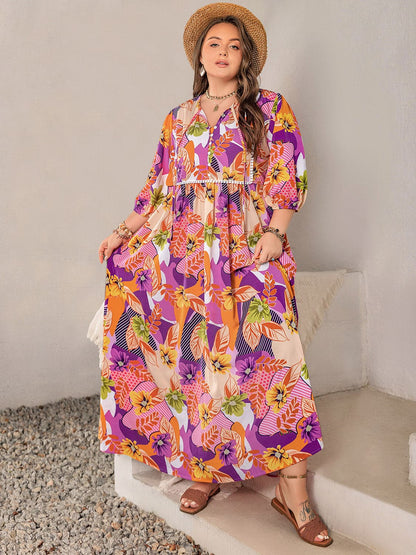 Plus Size Printed Tie Neck Maxi Dress.