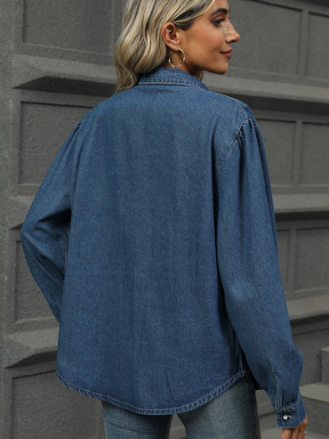 Classic button-down denim shirt with collar and long sleeves