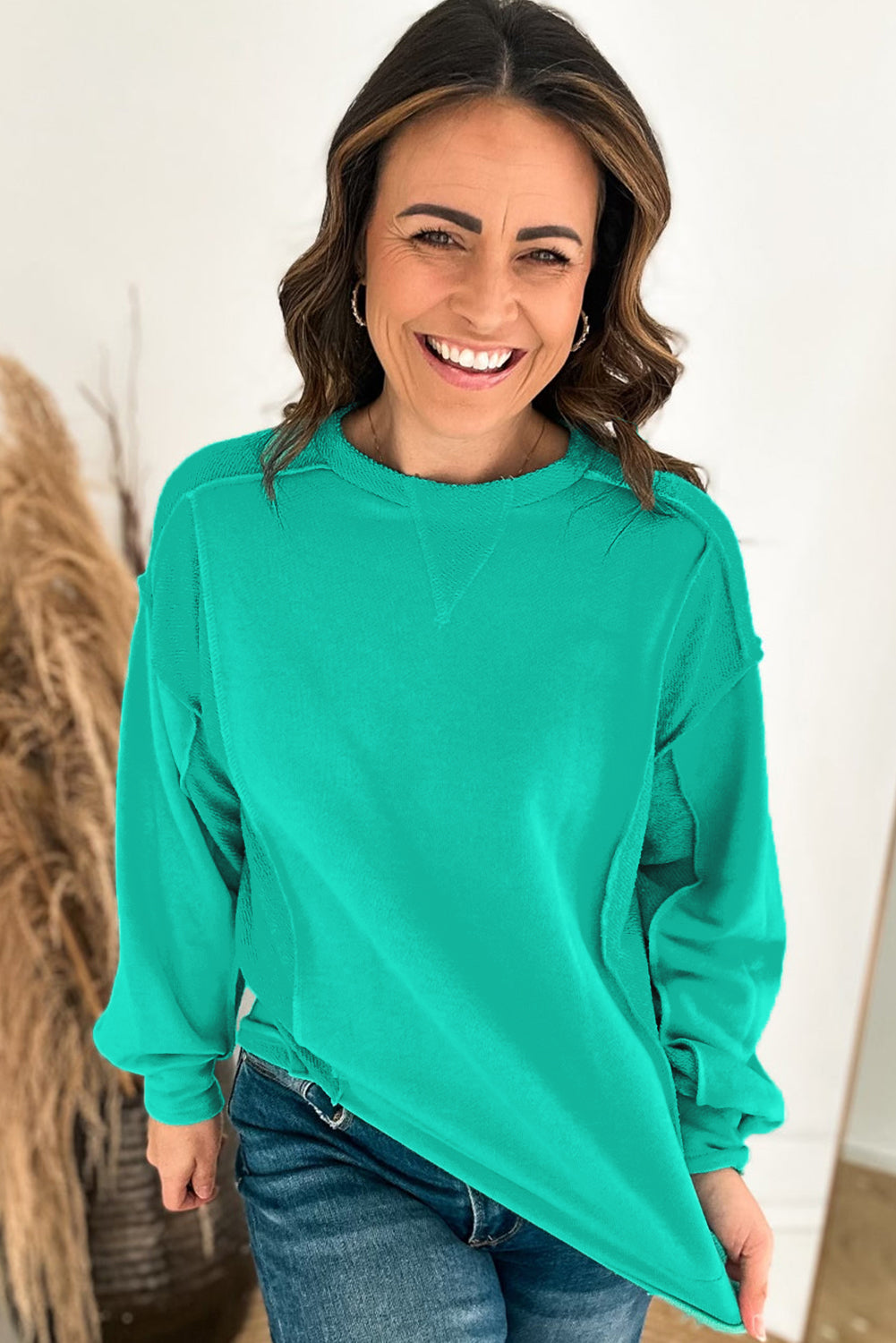 Mint green spliced pullover sweatshirt with round neckline