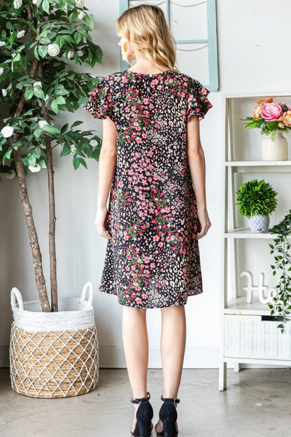 Heimish Full Size Printed Ruffled Short Sleeve Dress with Pockets.