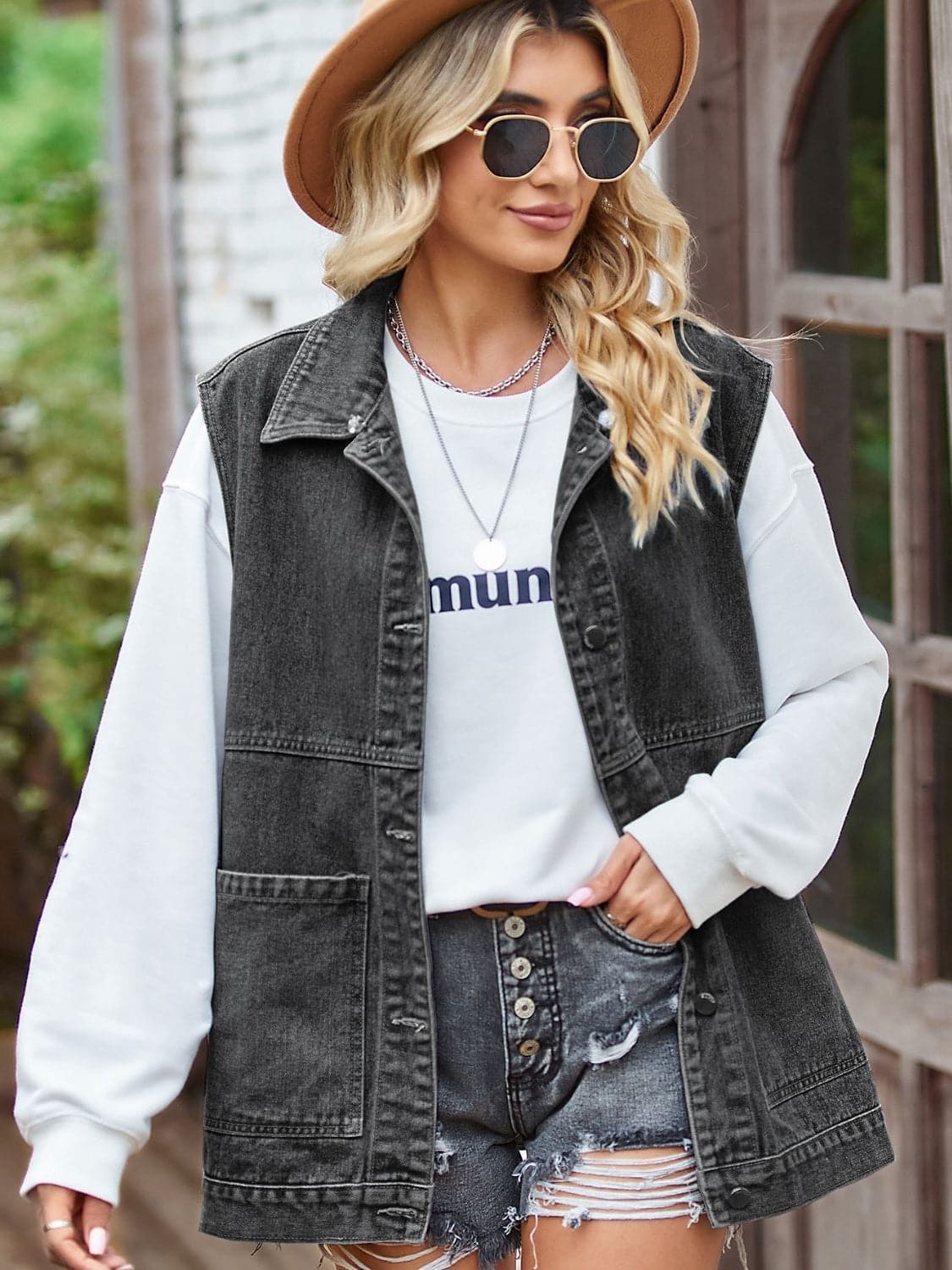 Button Front Sleeveless Denim Jacket.