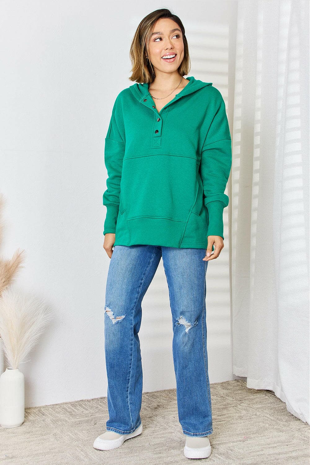 Zenana Half Snap Long Sleeve Hoodie.