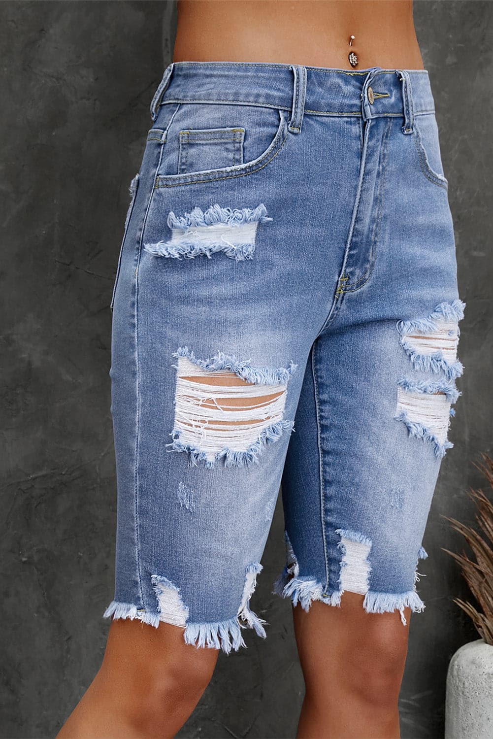 Distressed Frayed Hem Denim Bermuda Shorts.