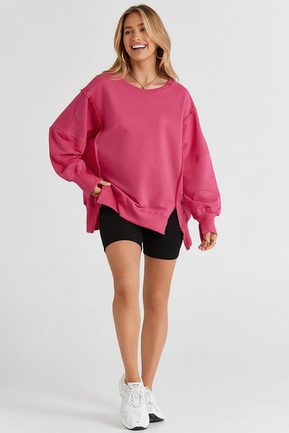 Slit Exposed Seam Round Neck Sweatshirt.