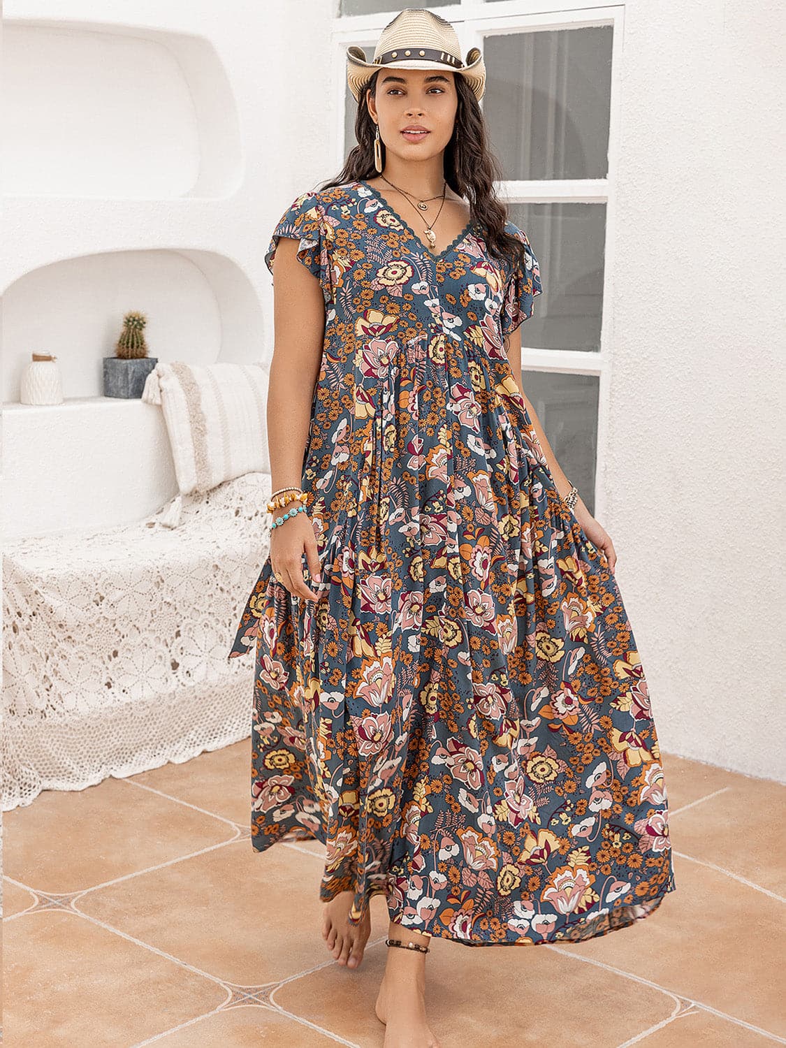 Plus Size Ruffled Printed Cap Sleeve Dress.