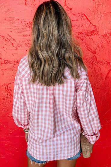 Chic pink gingham collared shirt with functional chest pockets