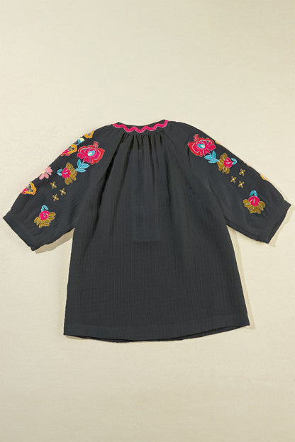 Embroidered Notched Half Sleeve Blouse.