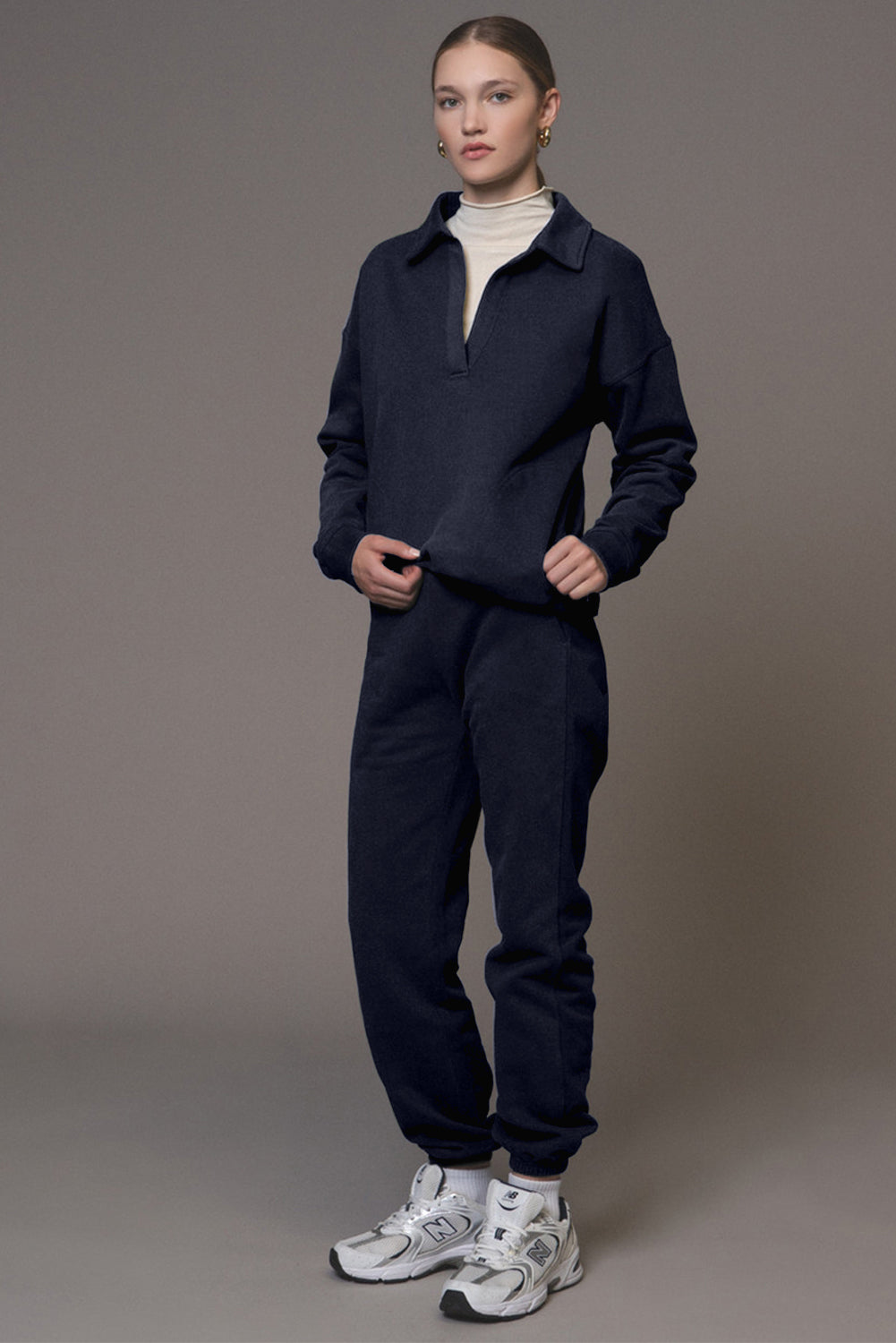 Navy blue pullover and joggers tracksuit with fold-down collar