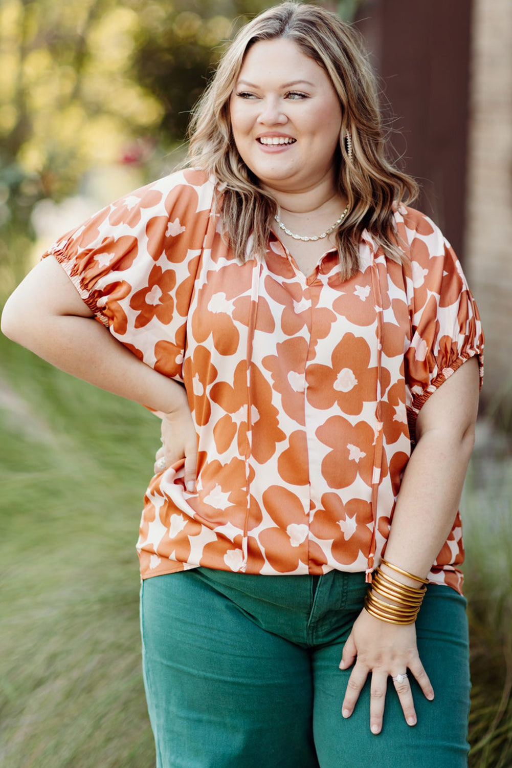 Floral Delight: Plus Size Orange V Neck Blouse with Drawstring Detail