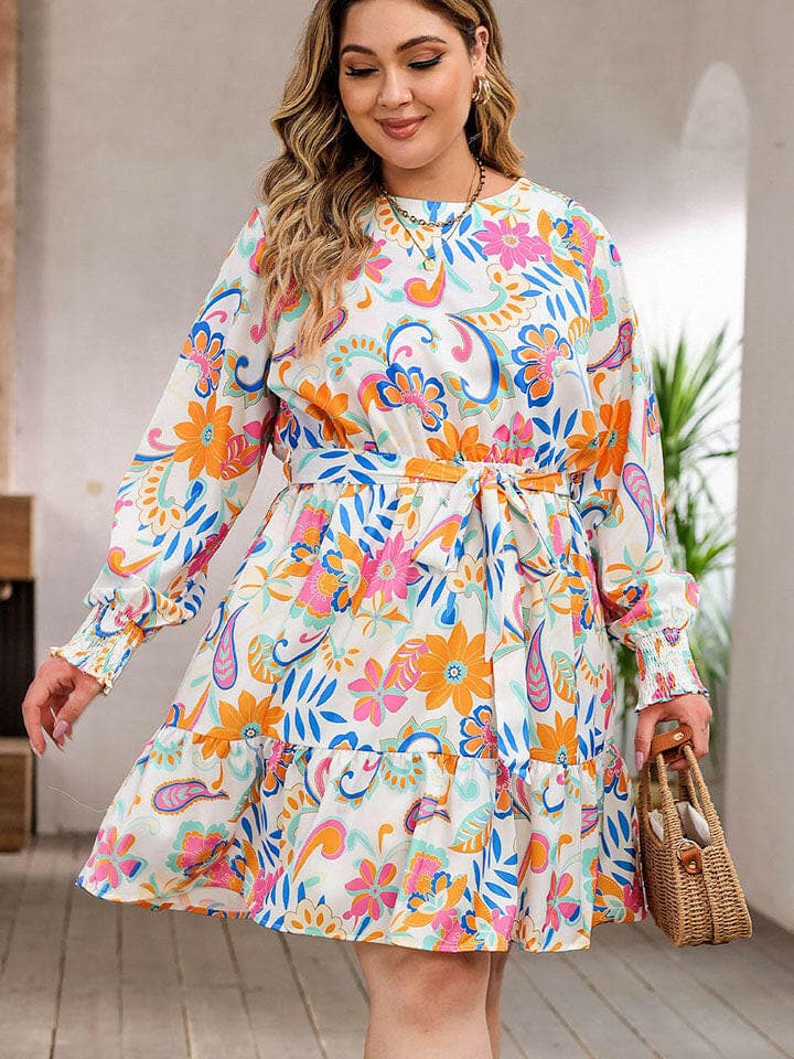 Plus size round neck floral lantern sleeve dress with belt, perfect for stylish occasions.