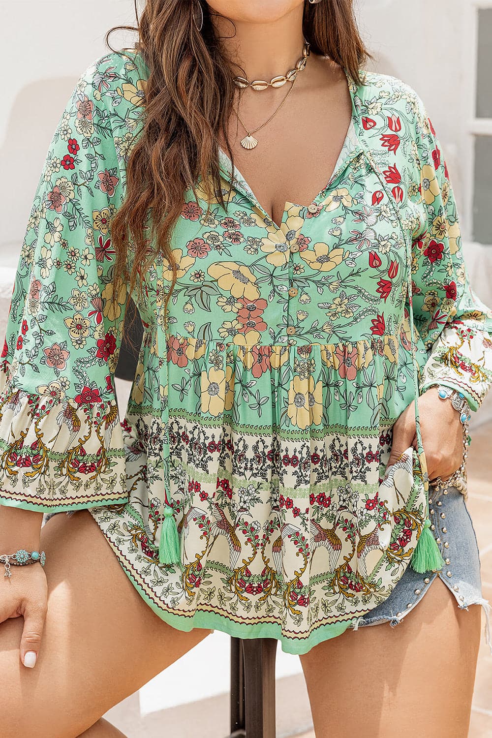 Plus Size Floral Tassel Tie Blouse.