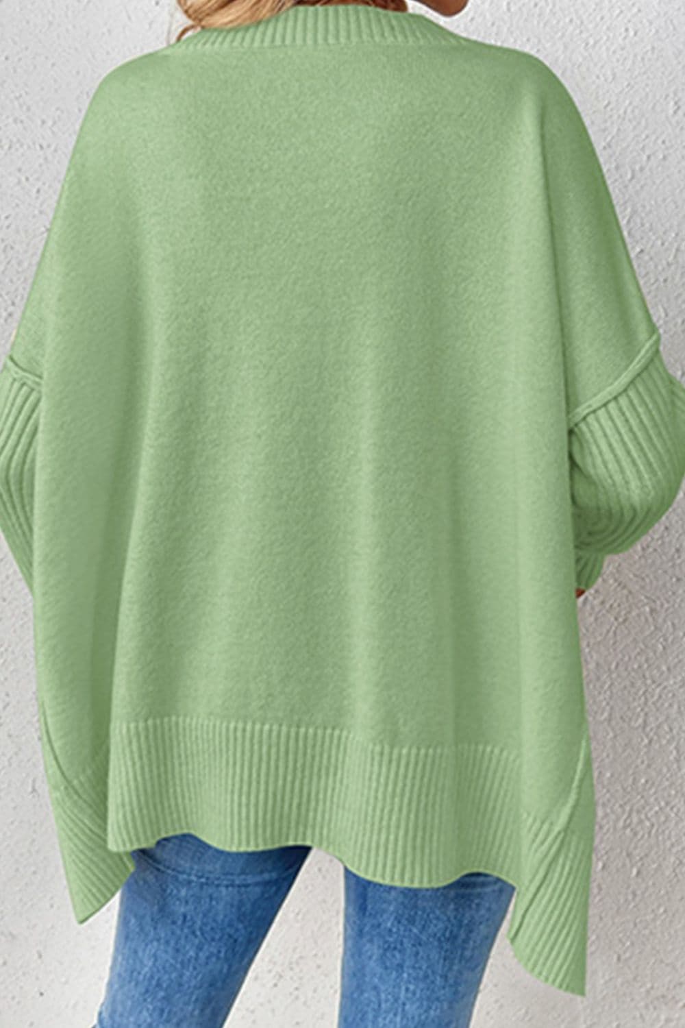 Slit V-Neck Dropped Shoulder Sweater.