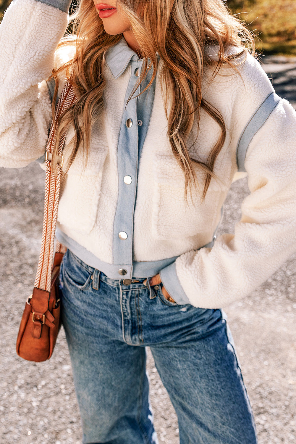 Chic white sherpa jacket with contrast trim and button closure