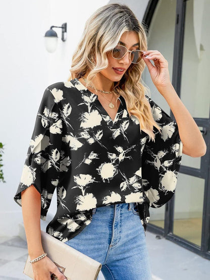 Printed Notched Half Sleeve Blouse.