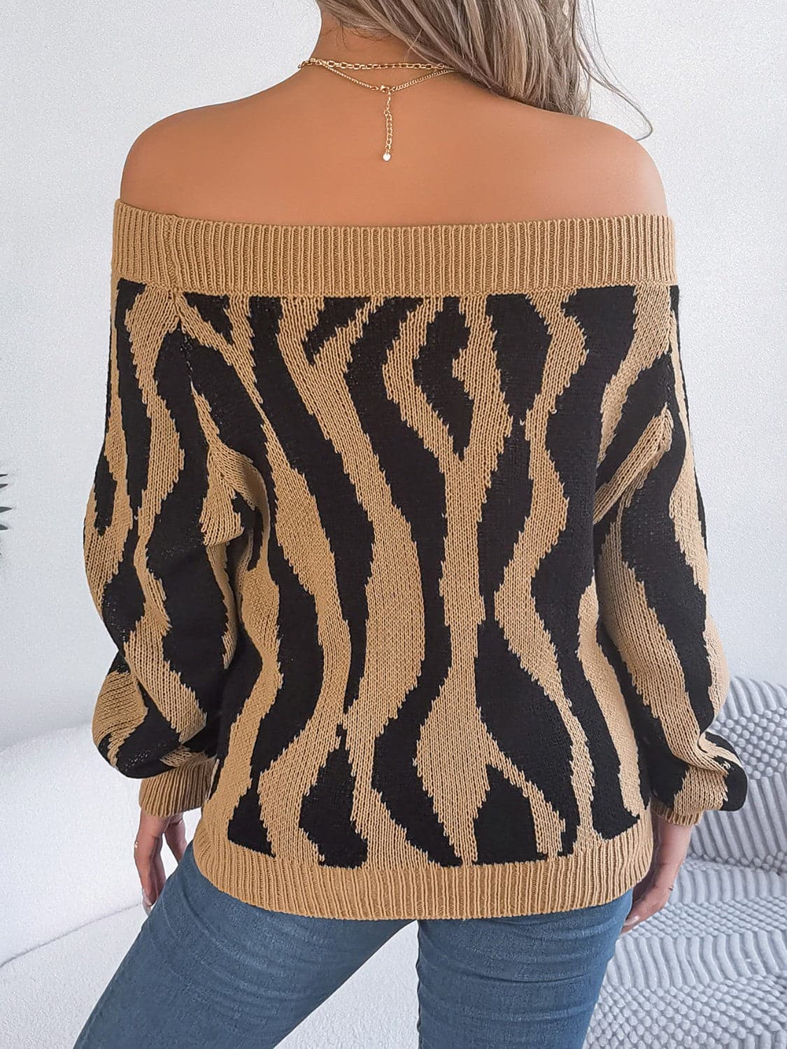 Off-Shoulder Animal Print Long Sleeve Sweater.