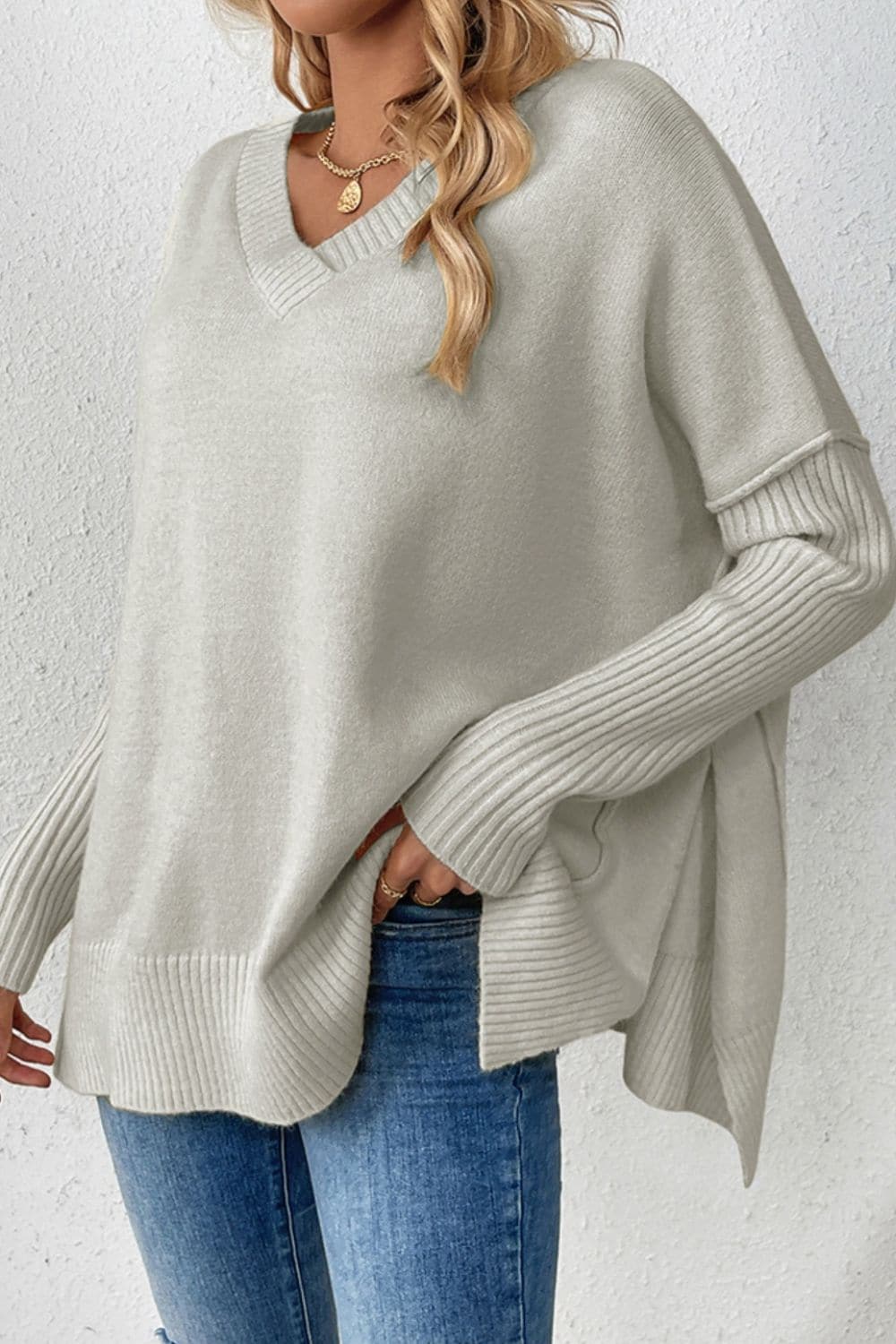 Slit V-Neck Dropped Shoulder Sweater.