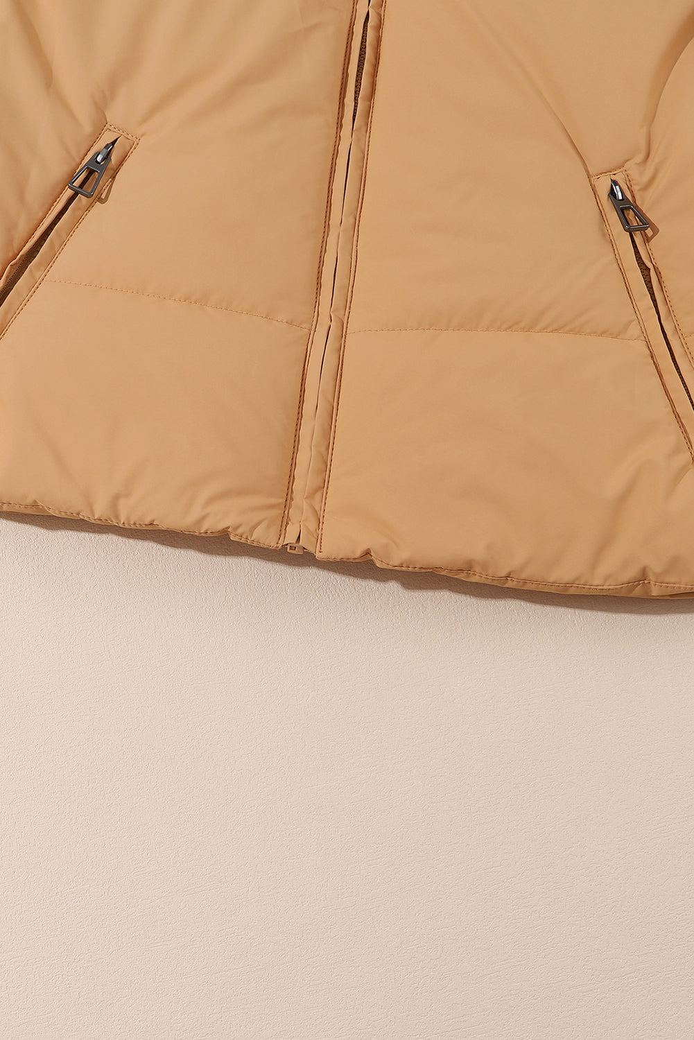 Cozy brown puffer coat with zip pockets