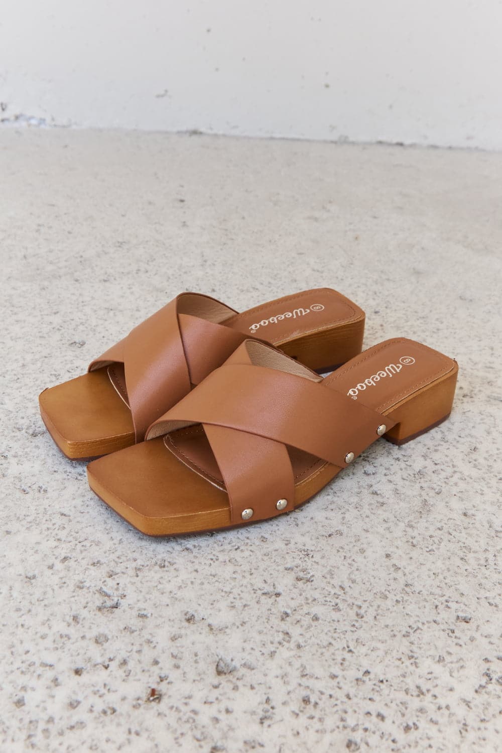 Weeboo Step Into Summer Criss Cross Wooden Clog Mule in Brown.