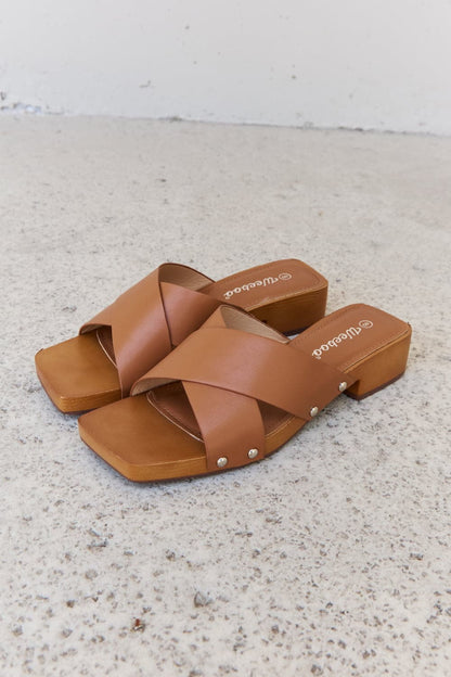 Weeboo Step Into Summer Criss Cross Wooden Clog Mule in Brown.