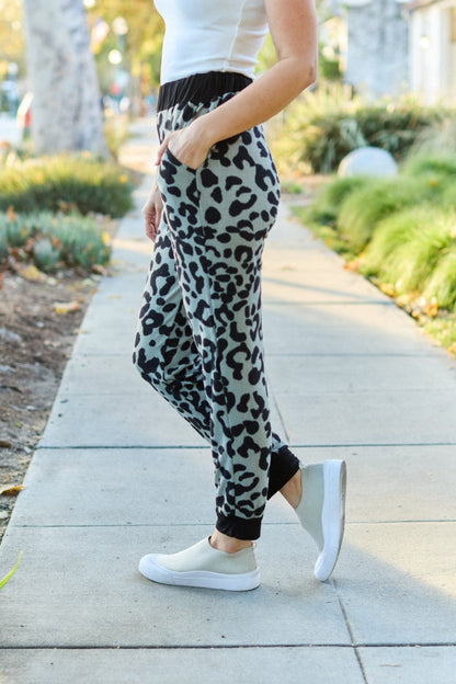 Celeste Design Full Size Leopard Contrast Sweatpants.