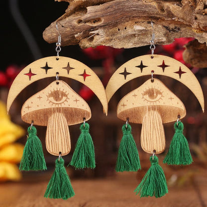 Celestial charm dangle earrings with tassel accents