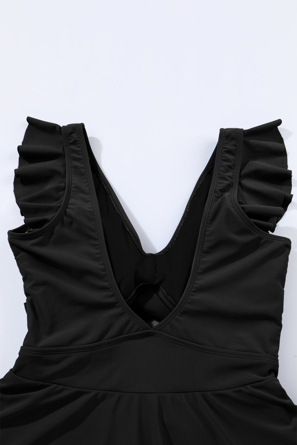 Chic black two-tone cutout swimdress with criss-cross design