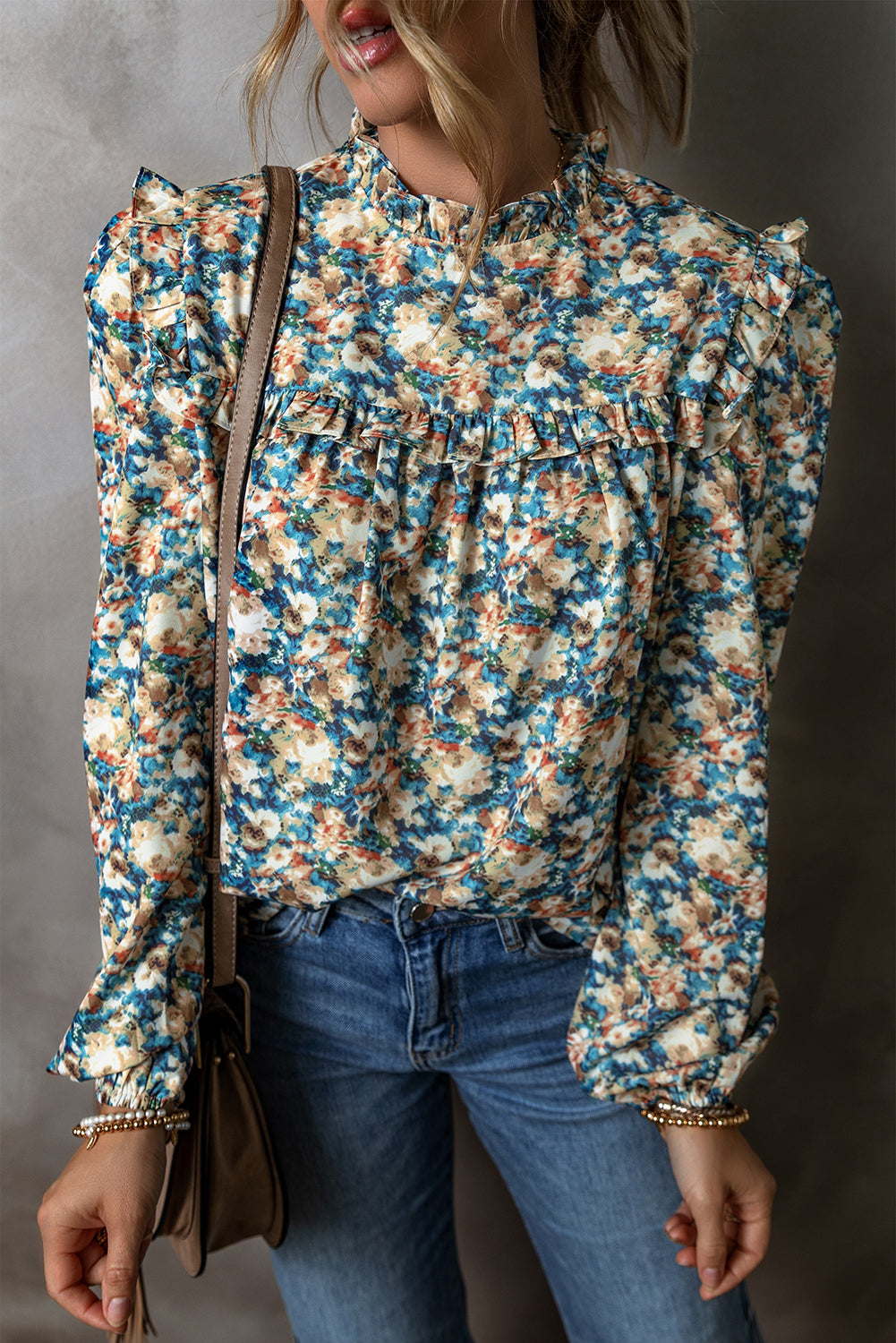 Floral frilled mock neck blouse with puff sleeves in sky blue