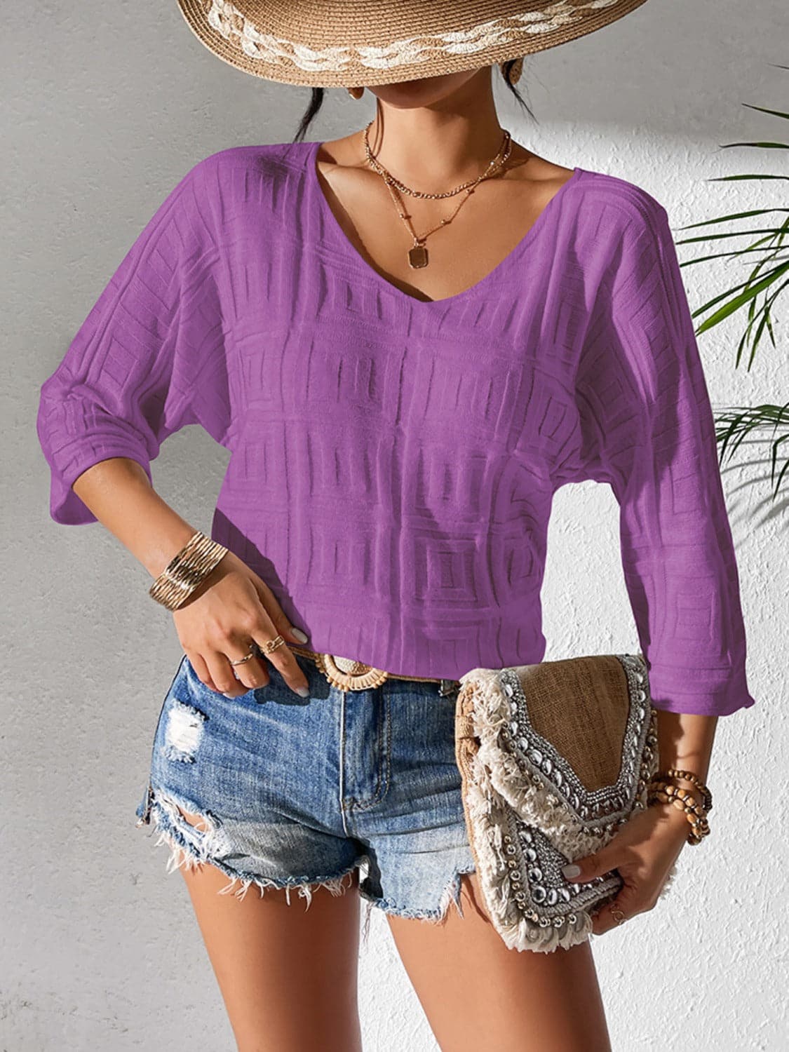 V-Neck Three-Quarter Sleeve Knit Top.