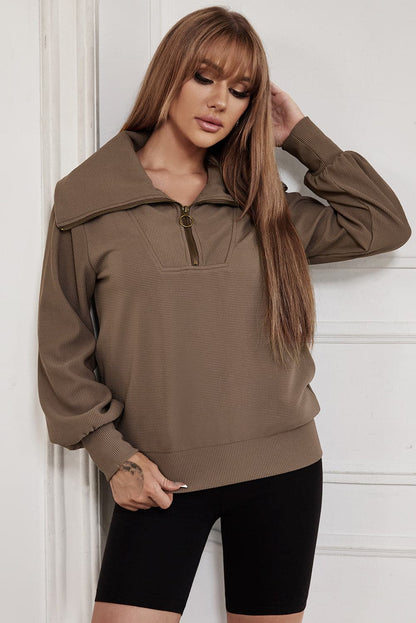 Pocketed Quarter Zip Collared Neck Sweatshirt.