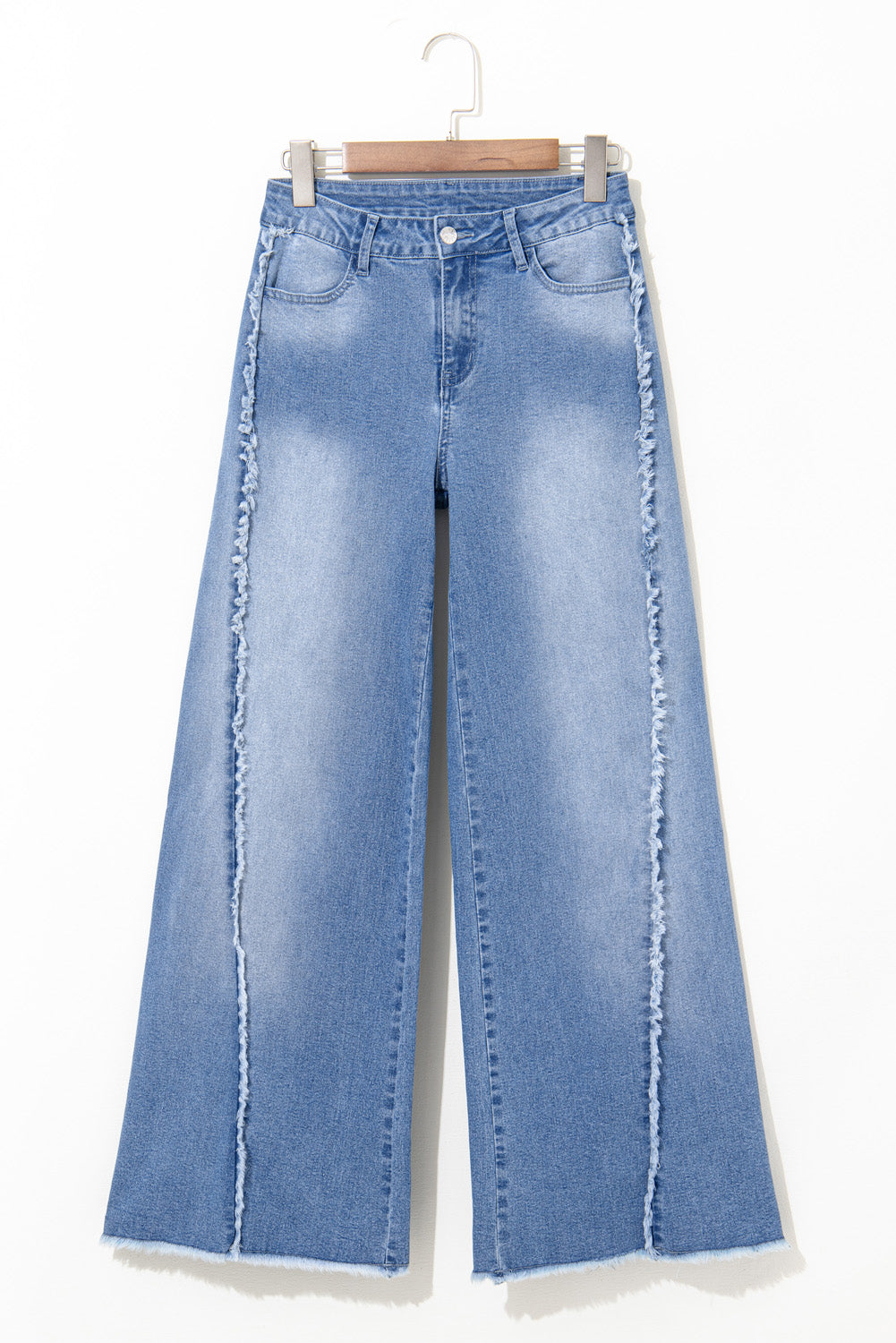 Vintage-inspired Beau Blue flared jeans with raw hem detailing