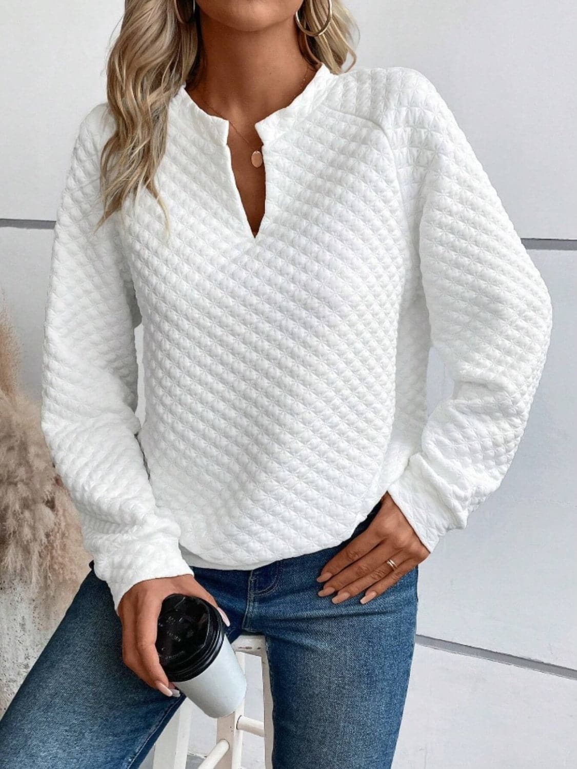 Notched Long Sleeve Sweatshirt.