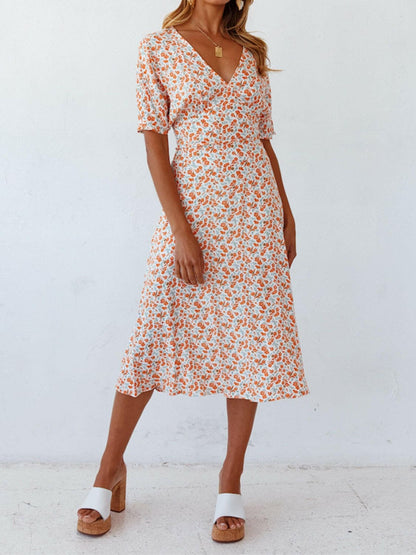 Ditsy Floral V-Neck Short Sleeve Midi DressDitsy Floral V-Neck Short Sleeve Midi Dress
 Embrace your femininity with the timeless elegance of the Ditsy Floral V-Neck Short Sleeve Midi Dress.
 Main Features:
 Love Salve -Neck Short Sleeve Midi Dressswimwear