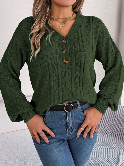 Chic cable-knit v-neck sweater with buttoned details