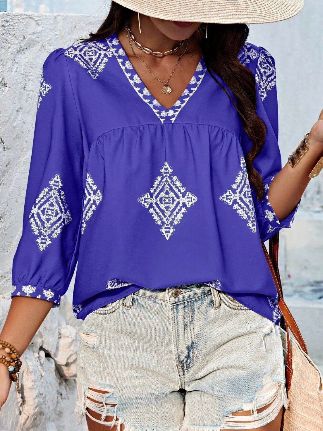 Printed V-Neck Three-Quarter Sleeve Blouse.