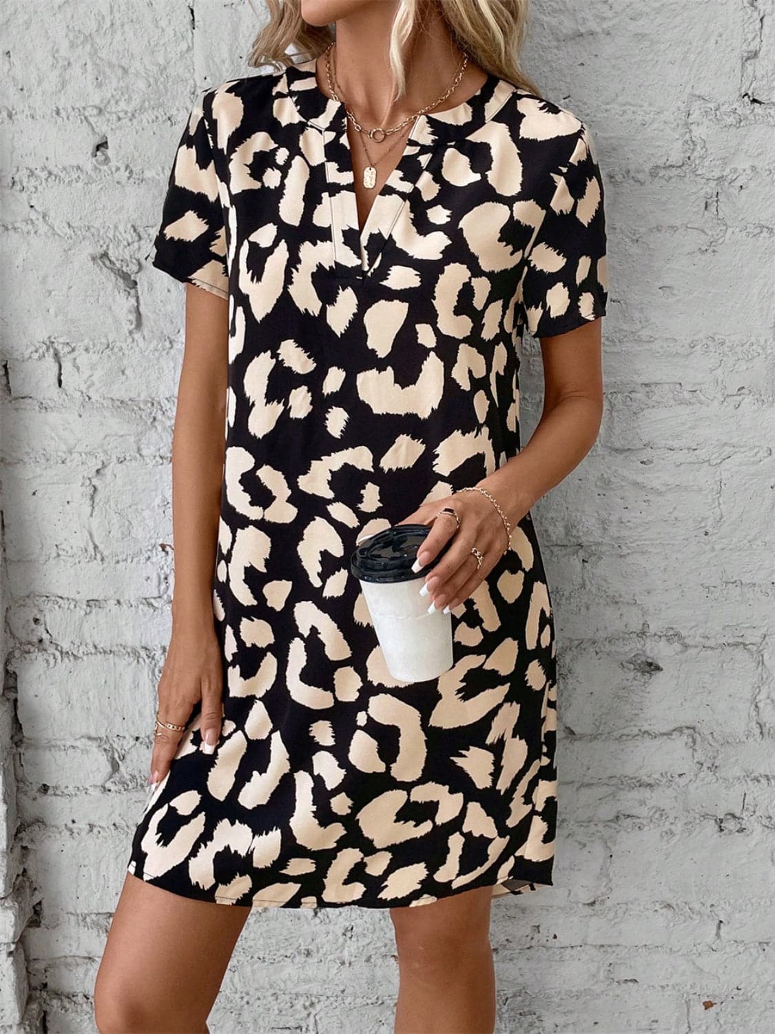 Printed Notched Short Sleeve Mini Dress.