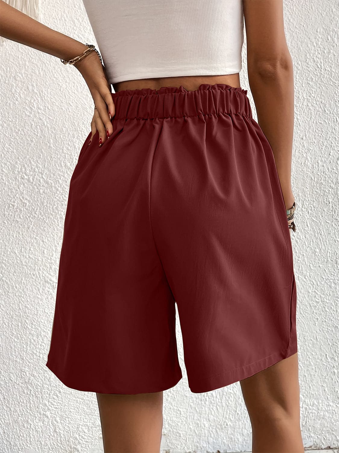 Pocketed Half Elastic Waist Shorts.