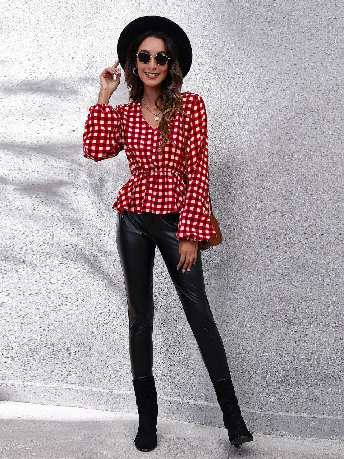 Plaid V-Neck Balloon Sleeve Peplum BlouseStay Chic with Our Plaid V-Neck Balloon Sleeve Peplum Blouse
 Enhance your wardrobe with our stylish Plaid V-Neck Balloon Sleeve Peplum Blouse that effortlessly combLove Salve -Neck Balloon Sleeve Peplum BlouseBlouses