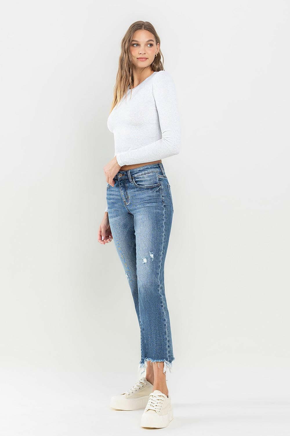 Lovervet Mid Rise Frayed Hem Jeans.