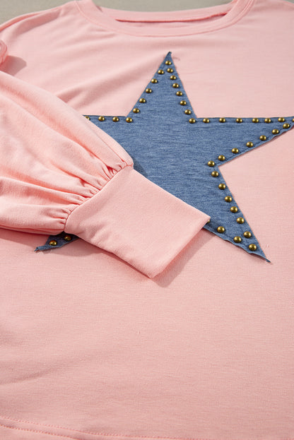 Celestial chic: Gossamer pink oversized long sleeve top with star graphic and studs