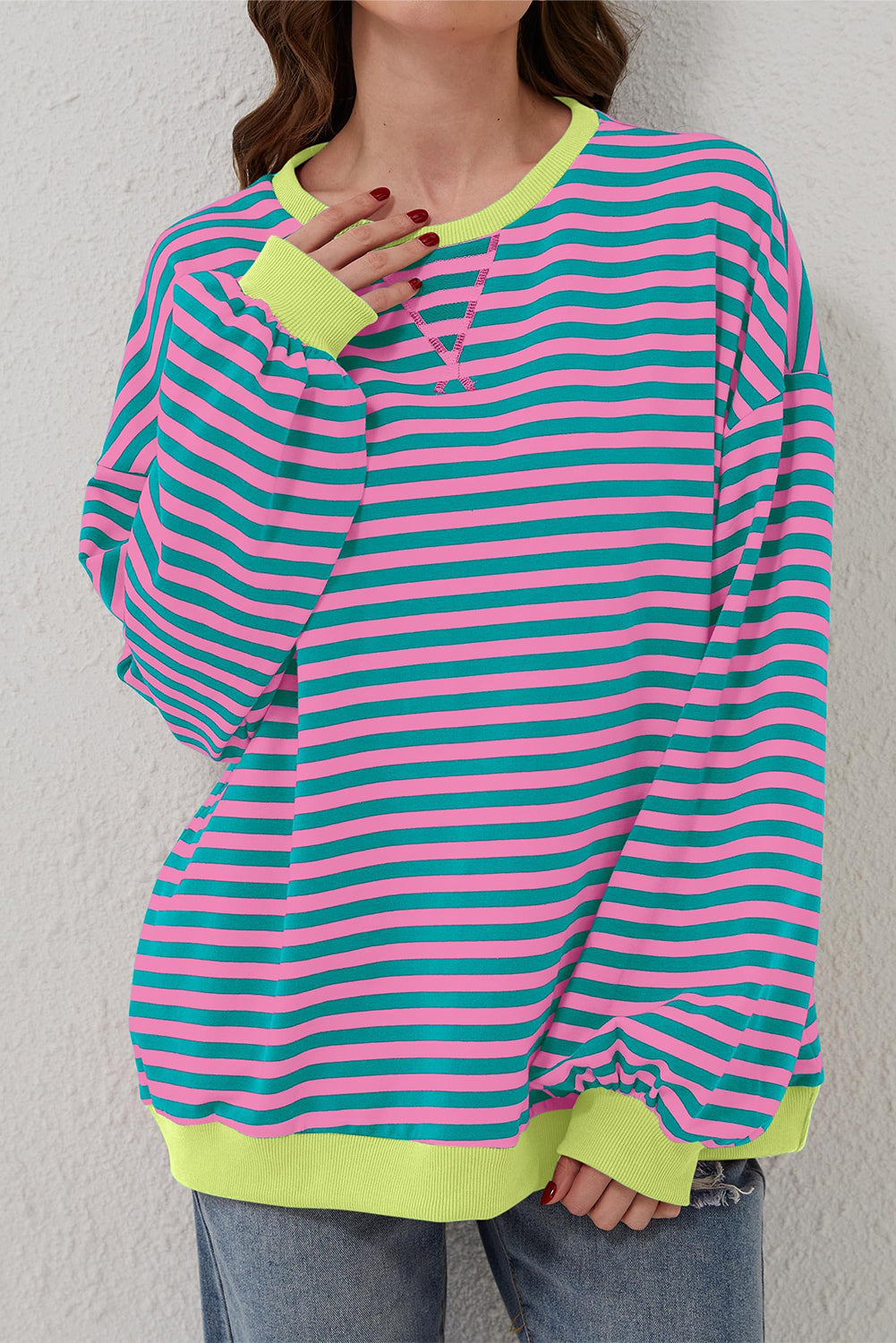 Trendy oversized green striped pullover