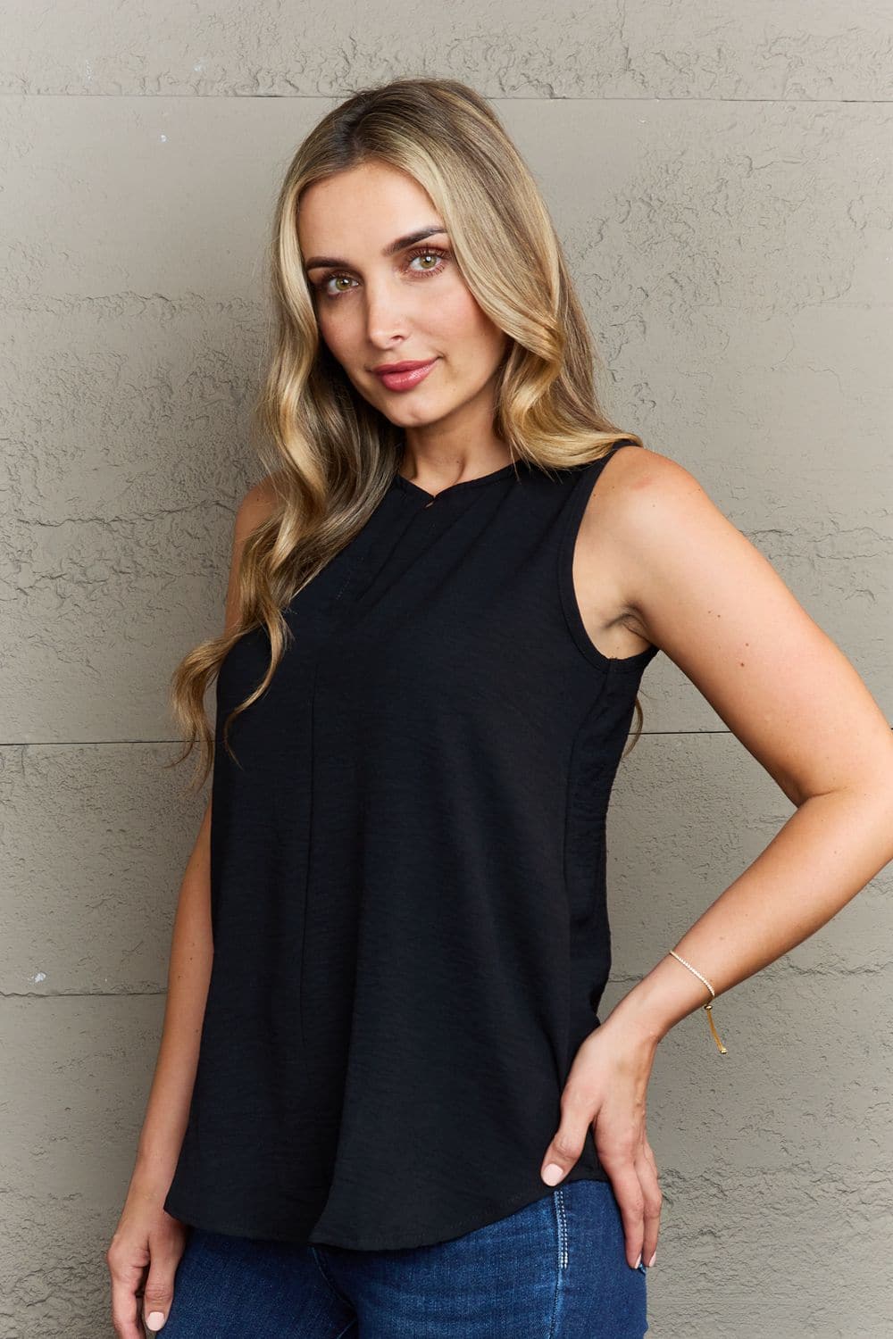 Ninexis First Glance Sleeveless Neckline Slit Top.