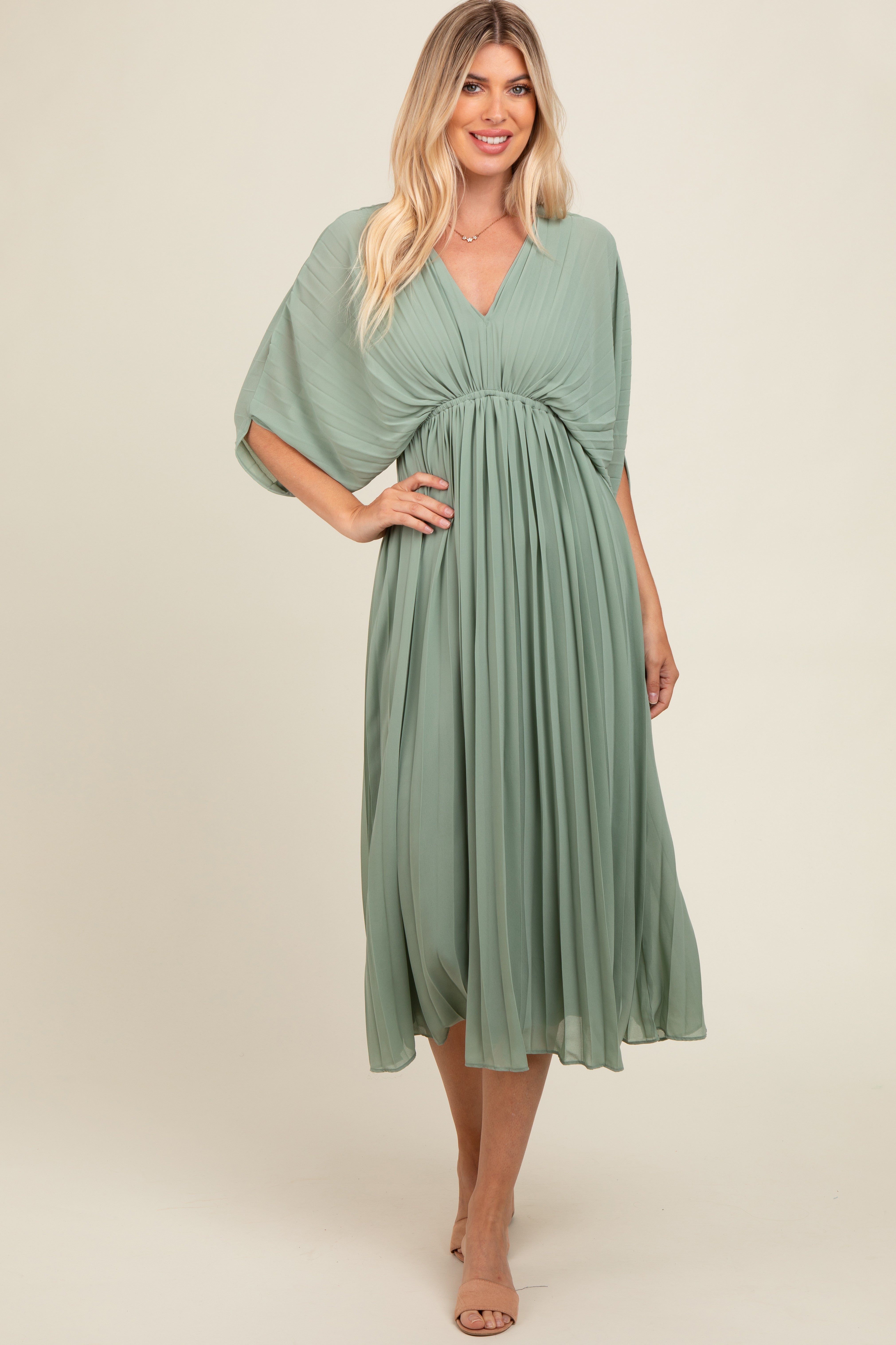 PinkBlush Light Olive Pleated V Neck Maternity Maxi Dress, styled on model, demonstrating its versatile and comfortable fit.