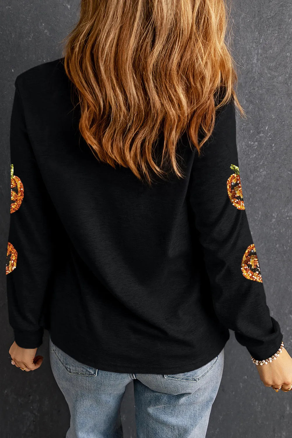 Sequin-embellished pumpkin graphic long sleeve top