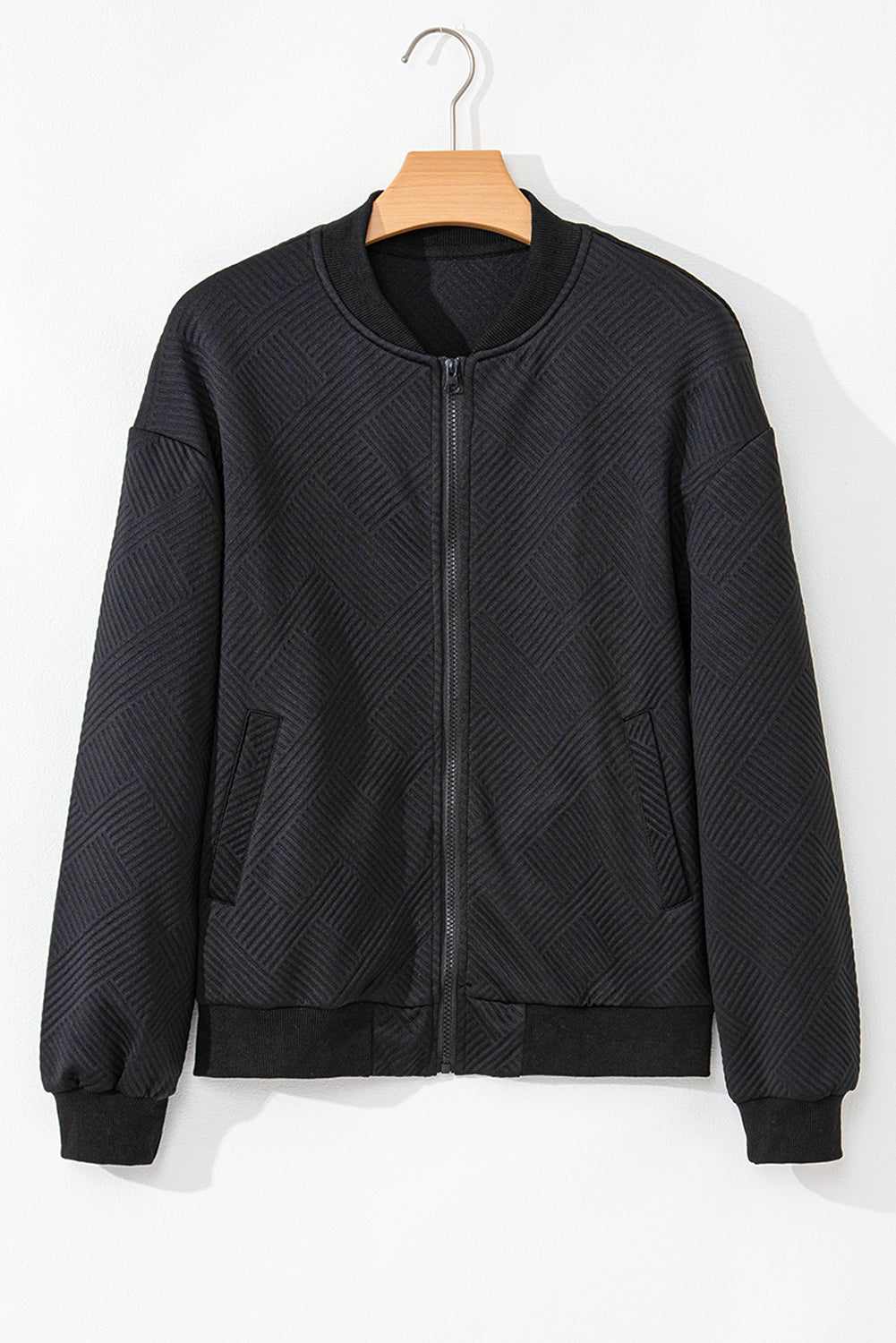 Sleek black textured bomber jacket with stand neck and zipper closure