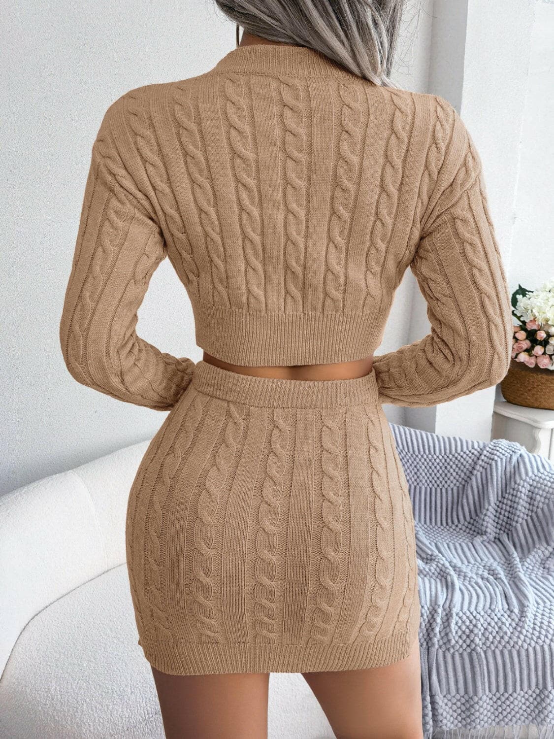 Cable-Knit Round Neck Top and Skirt Sweater Set.