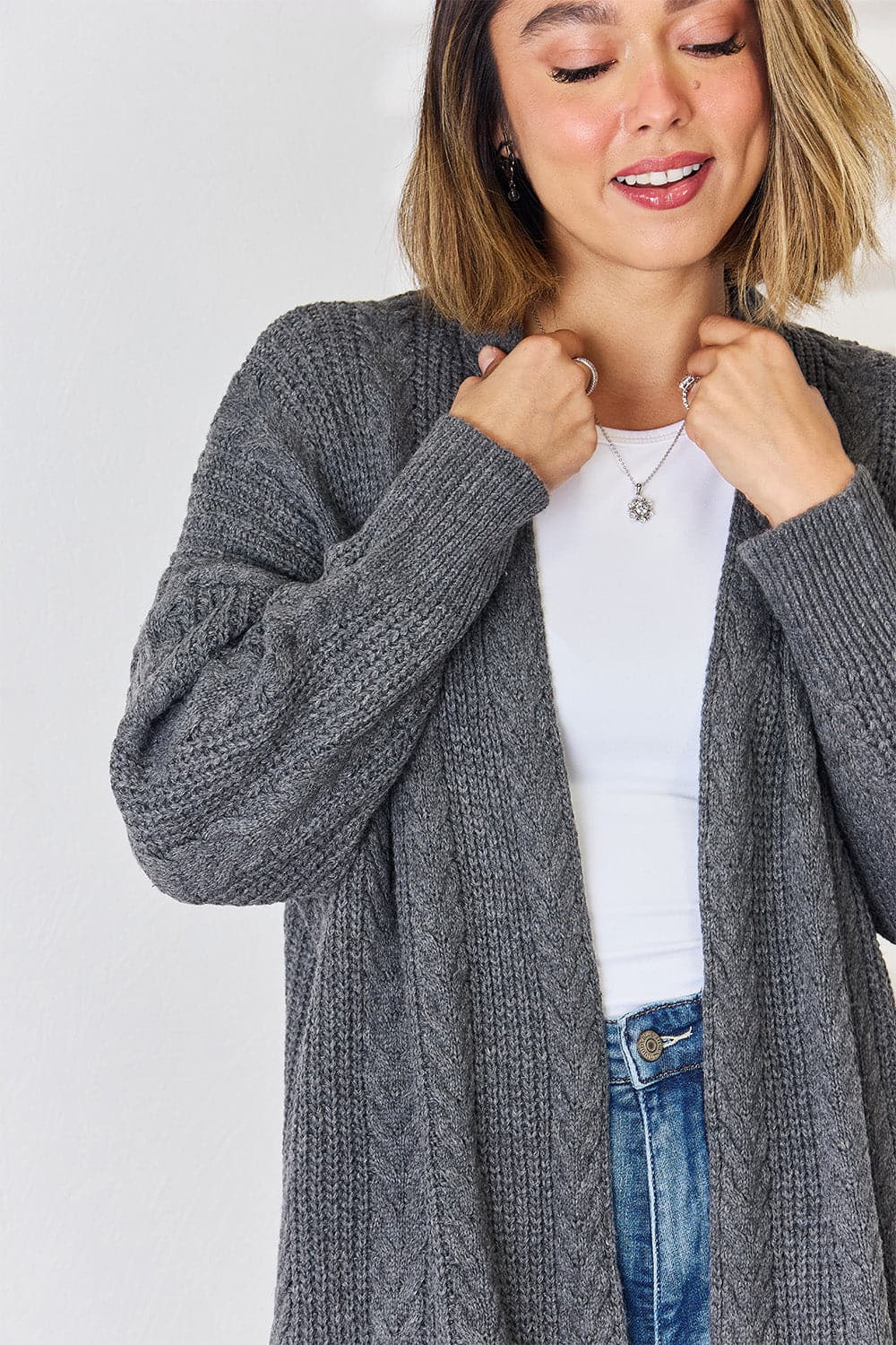 Cable-Knit Open Front Dropped Shoulder Cardigan.