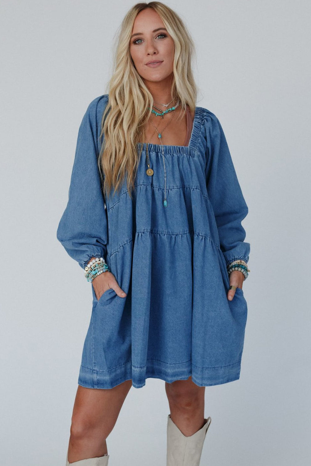 Dusk blue denim mini dress with square neckline and side pockets