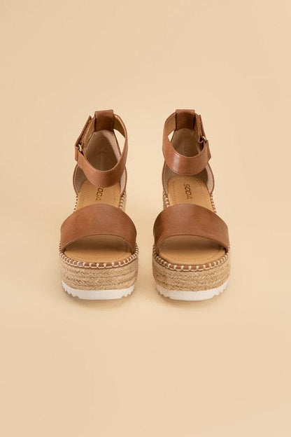 TUCKIN-S Platform Sandals.