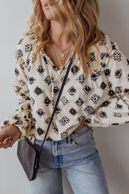 Frill Printed Tie Neck Long Sleeve Blouse.