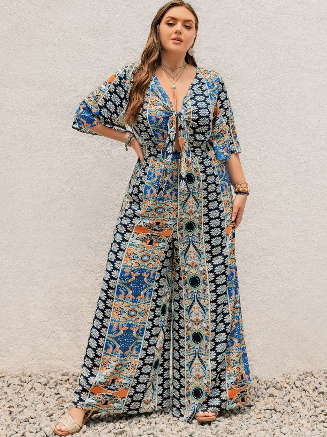 Plus Size Printed Half Sleeve Wide Leg Jumpsuit.